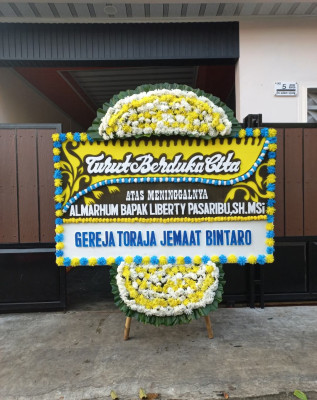 Papan Bunga Duka di Sigulang